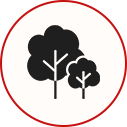 Black trees inside a red circular outline on a white background