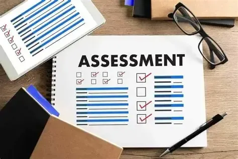 Assessment form on a desk with checkboxes, blue highlighted lines, a pen, and glasses nearby.