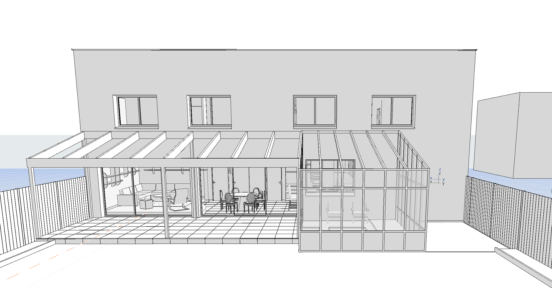 Vue arrière d'un bâtiment moderne avec une partie vitrée, un patio et un auvent.