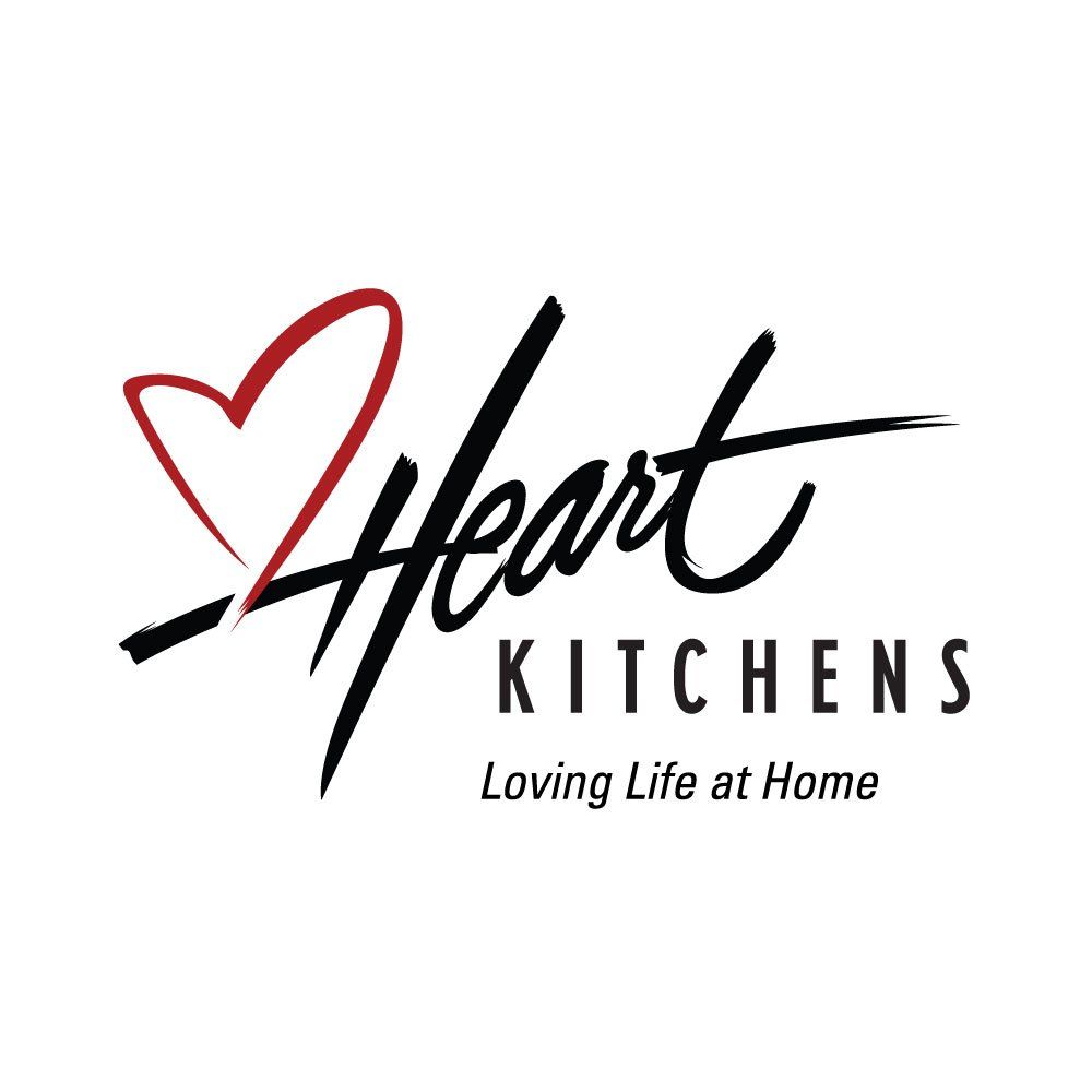 A heart kitchens logo with a heart and the words `` loving life at home ''.