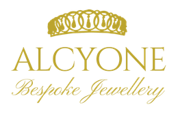 Gold logo for Alcyone Custom Made Jewellery featuring a tiara icon above the business name in elegant font.