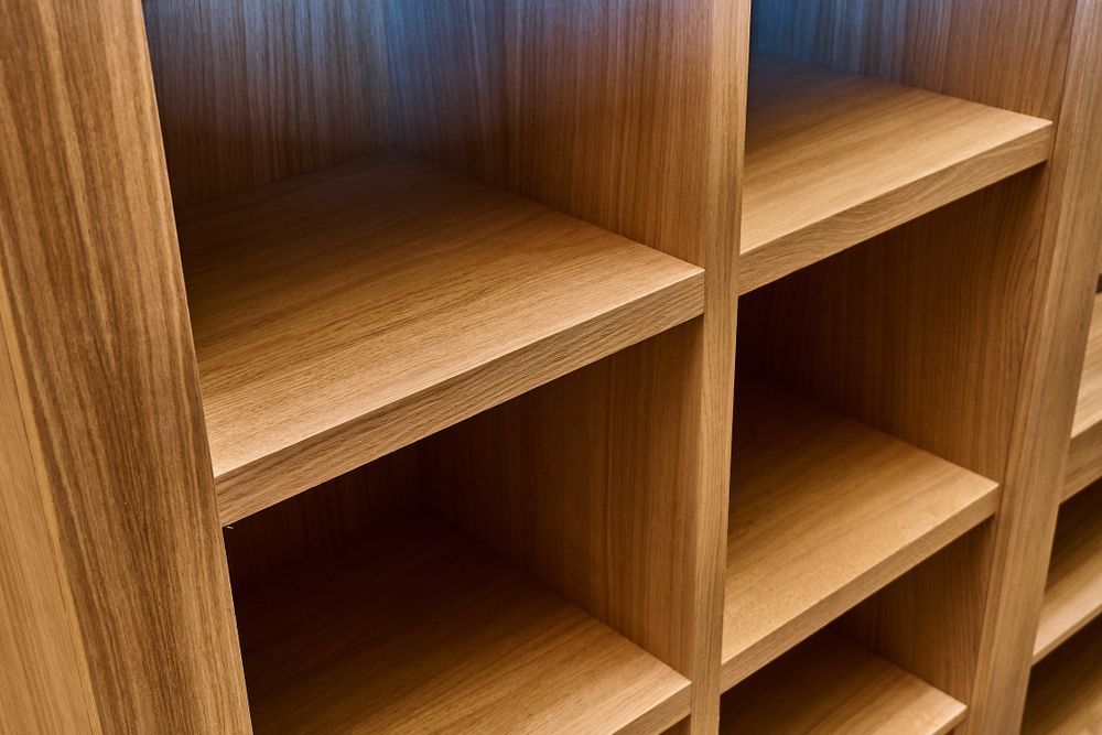 A Close Up of a Wooden Shelf With Empty Shelves — Pacific Cabinets In Evans Head, NSW
