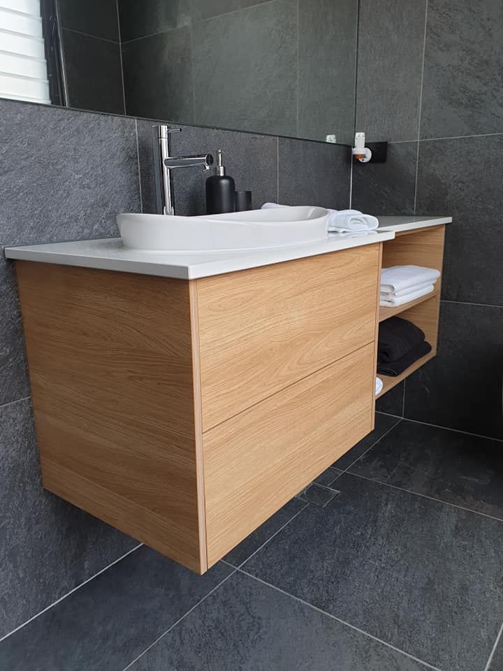 A Bathroom With Two Sinks and a Mirror — Pacific Cabinets In Yamba, NSW