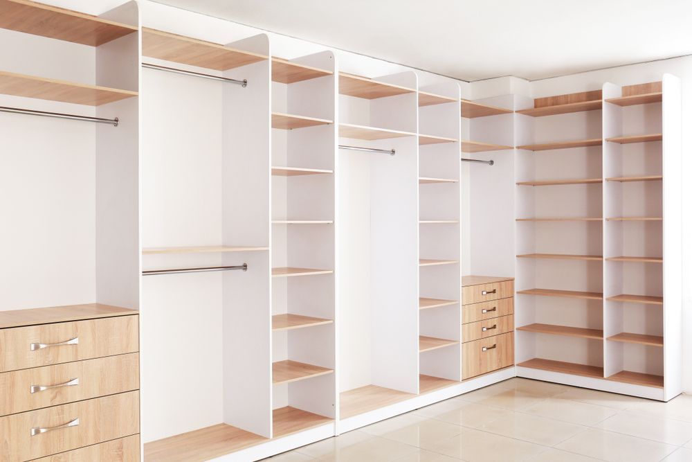 A Walk in Closet With Lots of Shelves and Drawers — Pacific Cabinets In Iluka, NSW