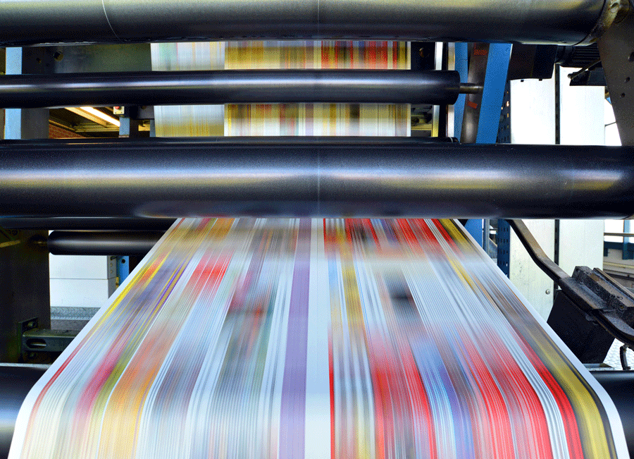A Printing Machine Is Printing a Lot of Papers in A Factory.