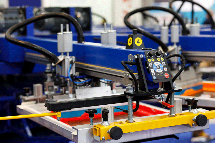 A Machine Is Sitting on Top of A Table in A Factory.