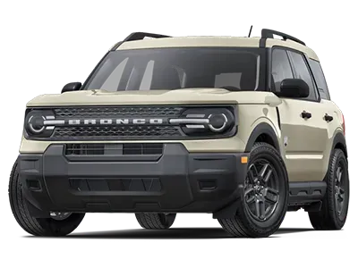 Tan Ford Bronco SUV on a white background, featuring a black grille and wheels.