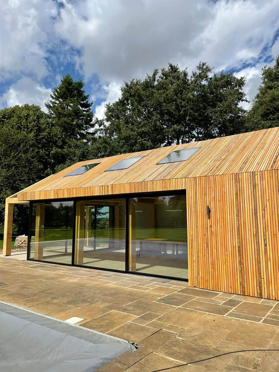 Timber cladding and roof on pool house