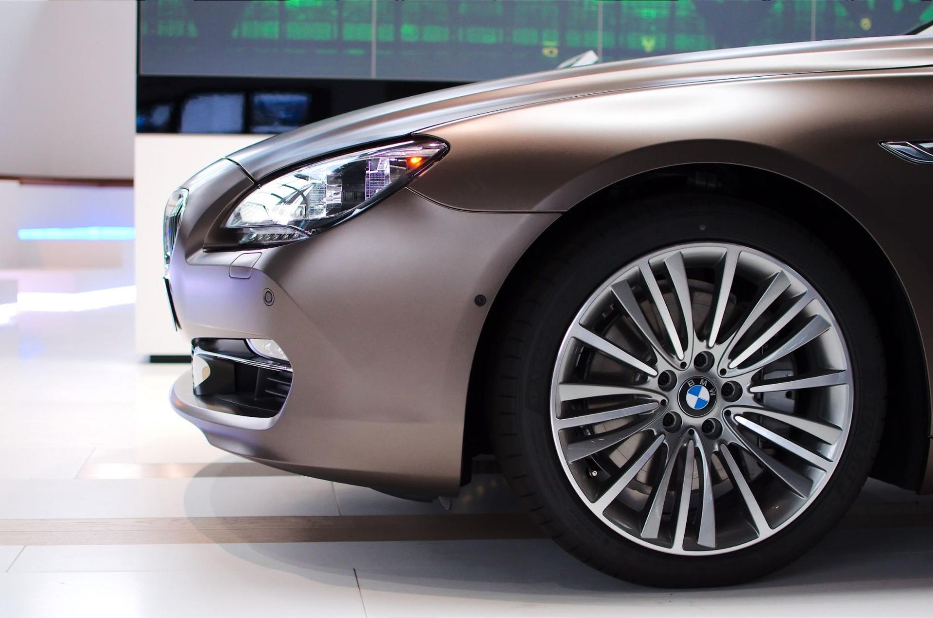 A close up of the front of a bmw car