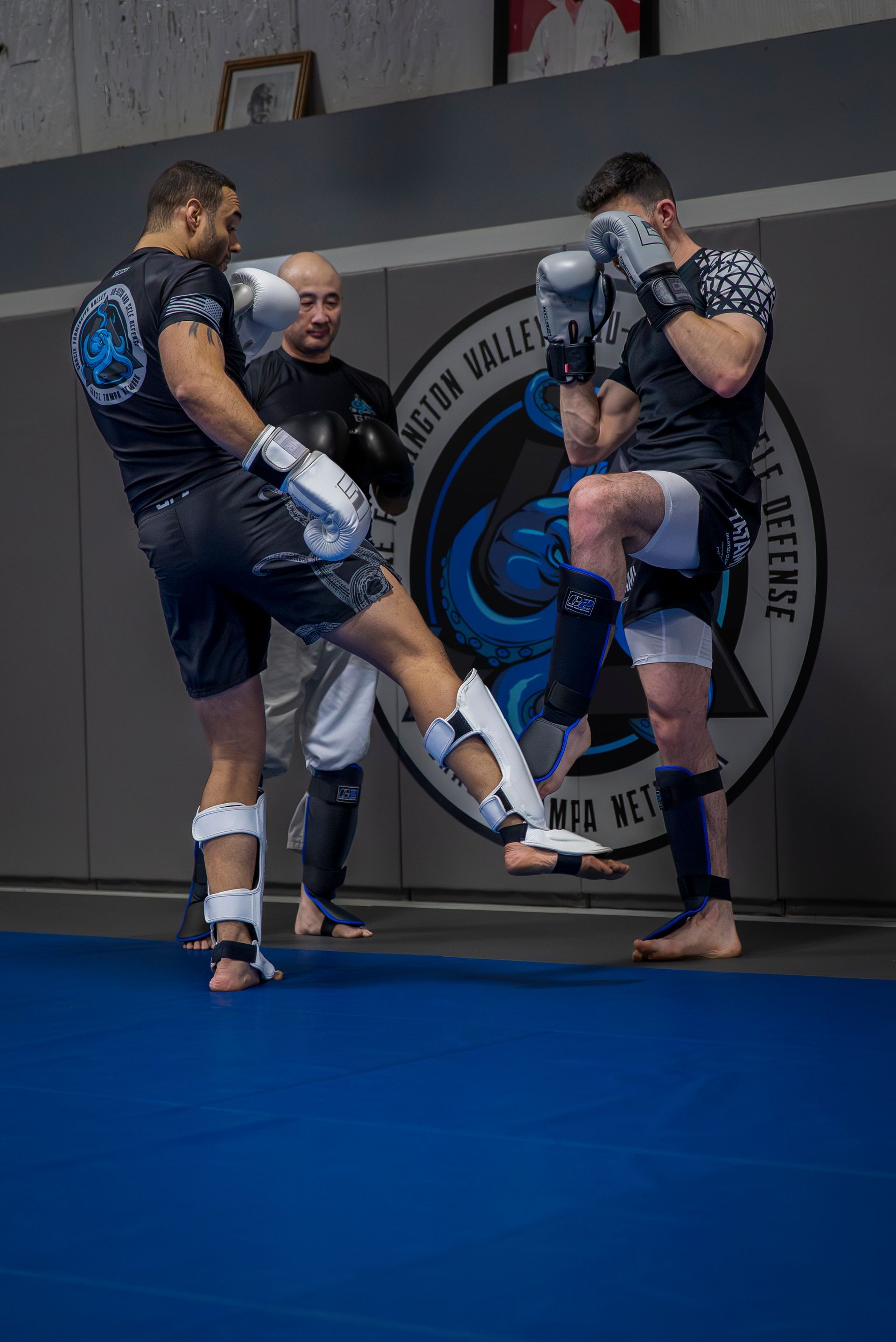 Adults practicing controlled rolling at Gracie Jiu-Jitsu Farmington Valley in Canton, CT.