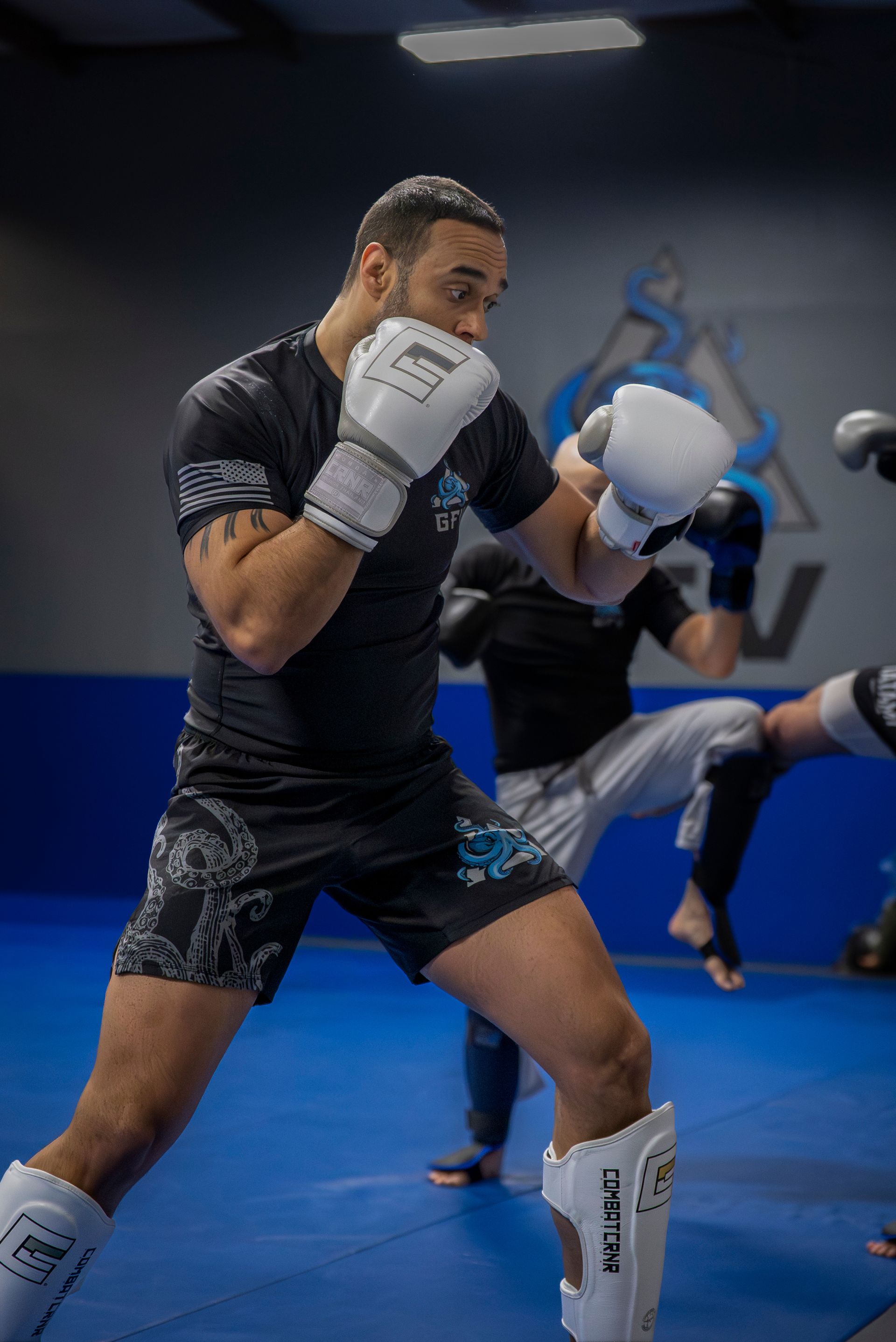 Students train Cardio Kickboxing at Gracie Jiu-Jitsu Farmington Valley in Canton, CT for fitness.