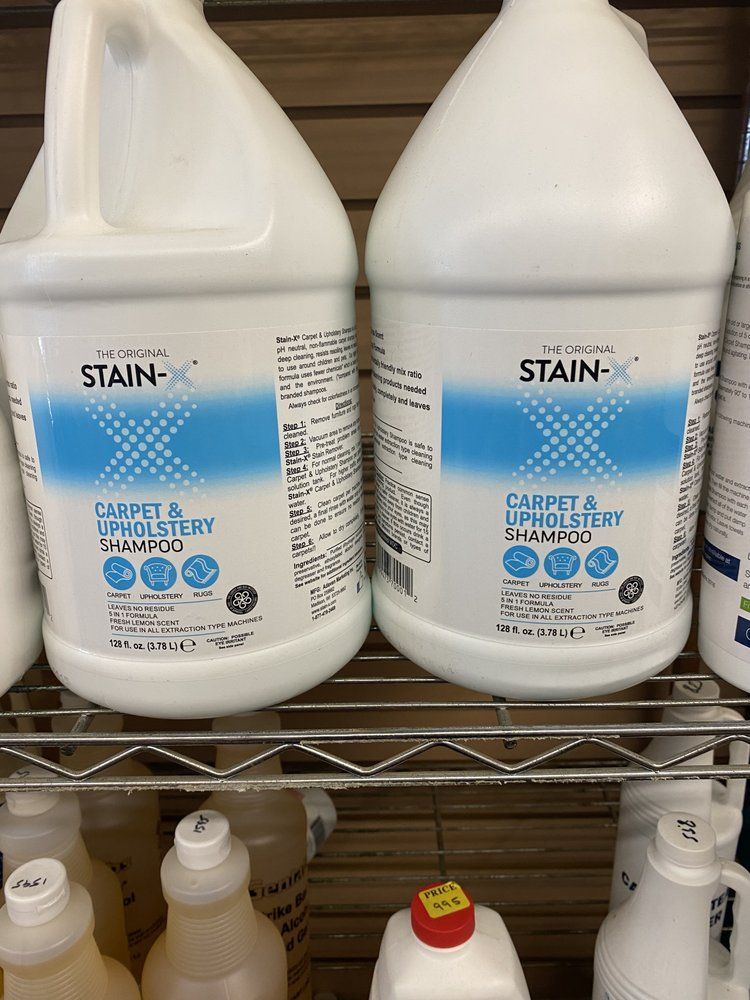 Two white jugs of 