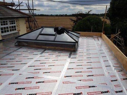 Large skylight installation on new flat roof