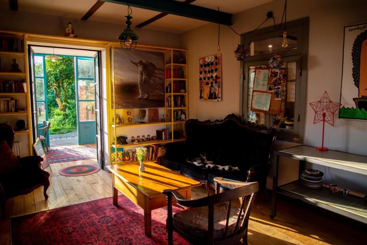 Comfortable lounge area with books, Shromantic Garden reception Guri