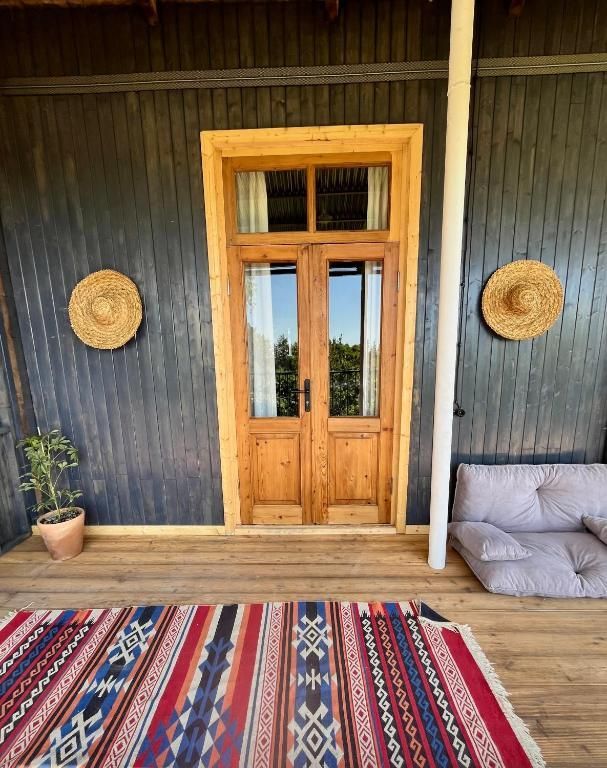 Private terrace overlooking the Black Sea in Shromantic Garden. Guria, Western Georgia