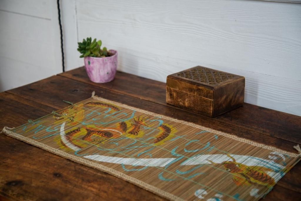 A table in a mountain view room with vintage details.