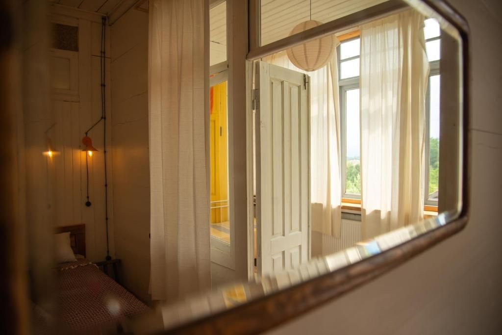 Shromantic Garden Triple room private bedroom with a bed and a window is reflected in a mirror.