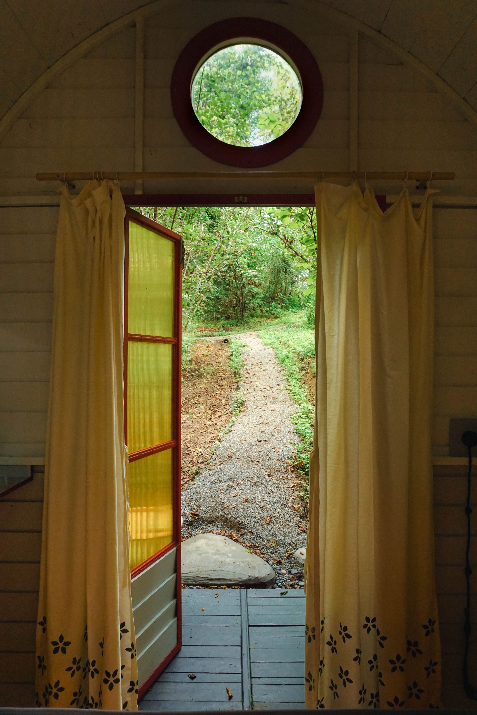 Forest trail leading to off-grid cabin, nature immersion at Shromantic Garden Guria
