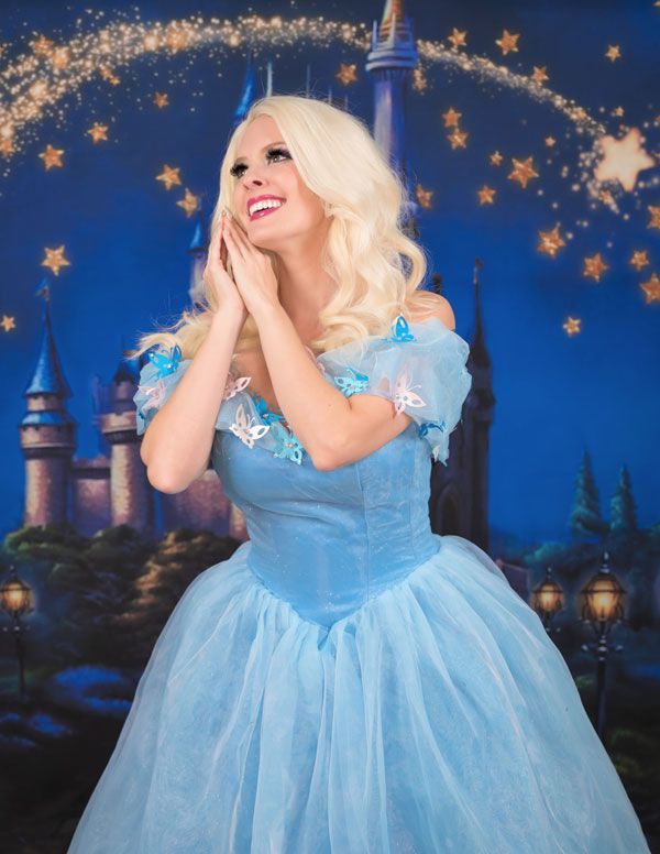 dressed up as princess in a blue dress