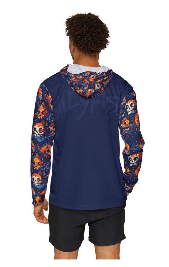 Person wearing a dark blue jacket with skull-patterned sleeves and hood, standing.