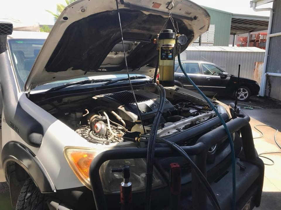 The Hood Of A Truck Is Open And The Engine Is Being Worked On — Advanced Automotive Services In Innisfail, QLD