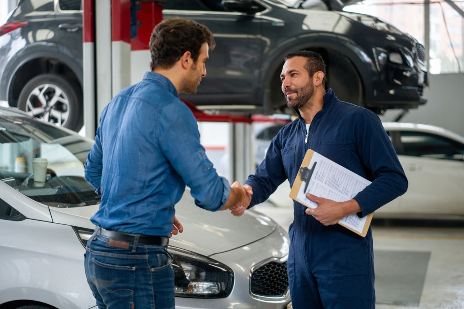 Man Greeting A Mechanic — Midland, MI — D And J Auto Repair