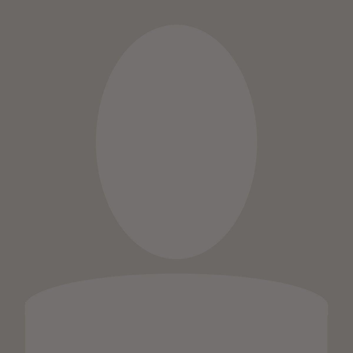 Silhouette of a person, head and shoulders, in grey tones.