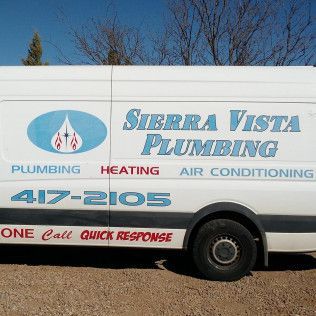 White Sierra Vista Plumbing service van with logo, phone number, and plumbing, heating, air conditioning text