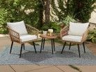 There are two chairs and a table on the patio.