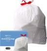 A white trash bag with a red bow is sitting on top of a blue box.