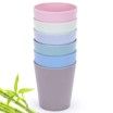 A stack of plastic cups sitting next to each other on a table.