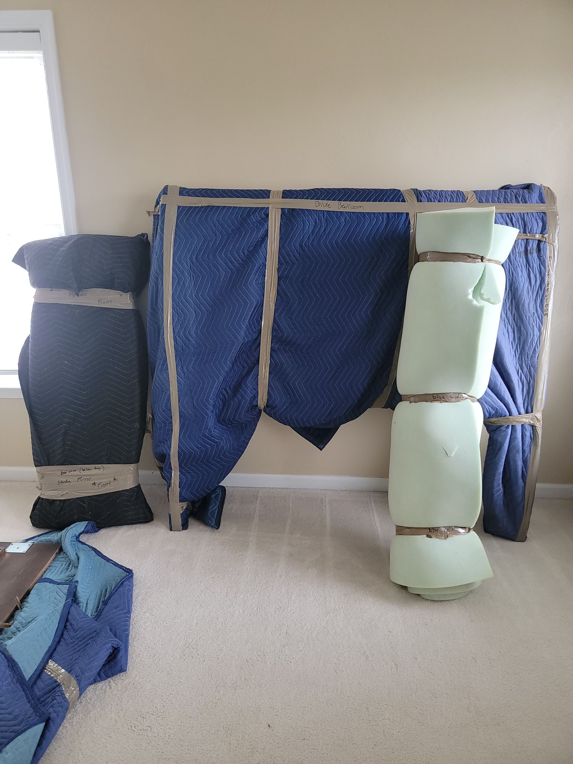 CJ Moving Services protecting a delicate, fragile item during a Durham senior move