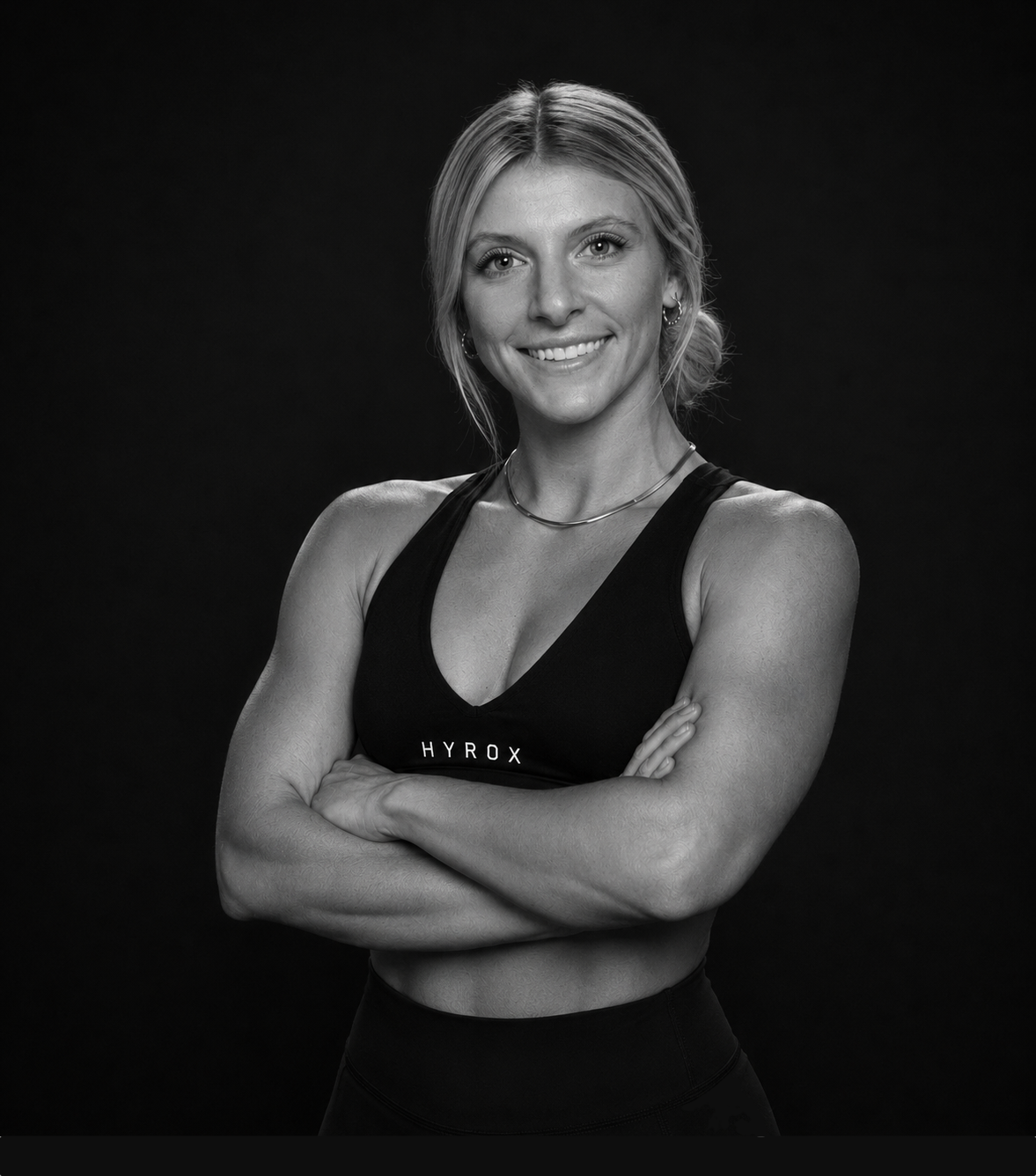 Portrait of Alyssa Rollins, Founder of EMBR HYROX Training Zone