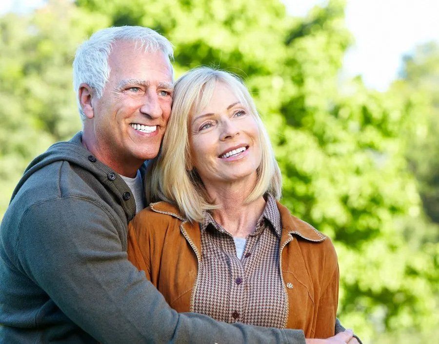 Happy Senior Couple — Amherst, OH — Gregory Sy, DDS
