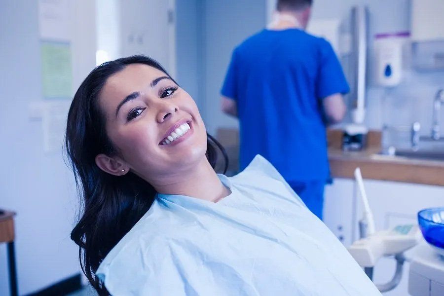 Smiling Female Patient at Dental Clinic — Amherst, OH — Gregory Sy, DDS