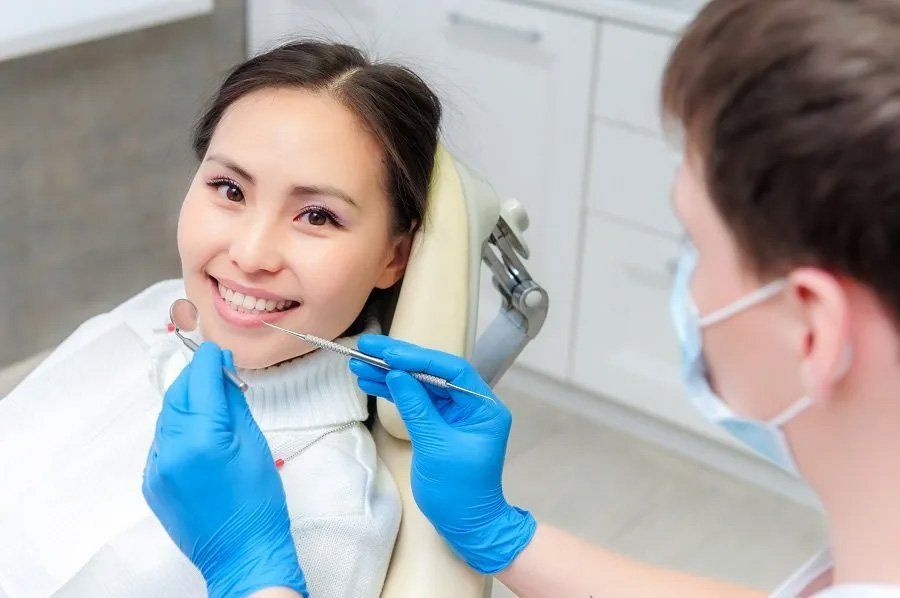 Young Female Patient at Dentist Office — Amherst, OH — Gregory Sy, DDS