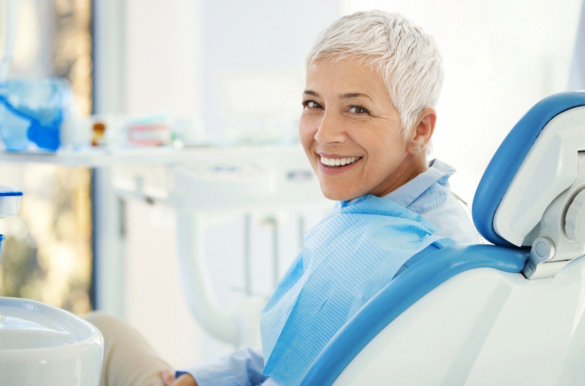 Female Patient at the Dentist — Amherst, OH — Gregory Sy, DDS