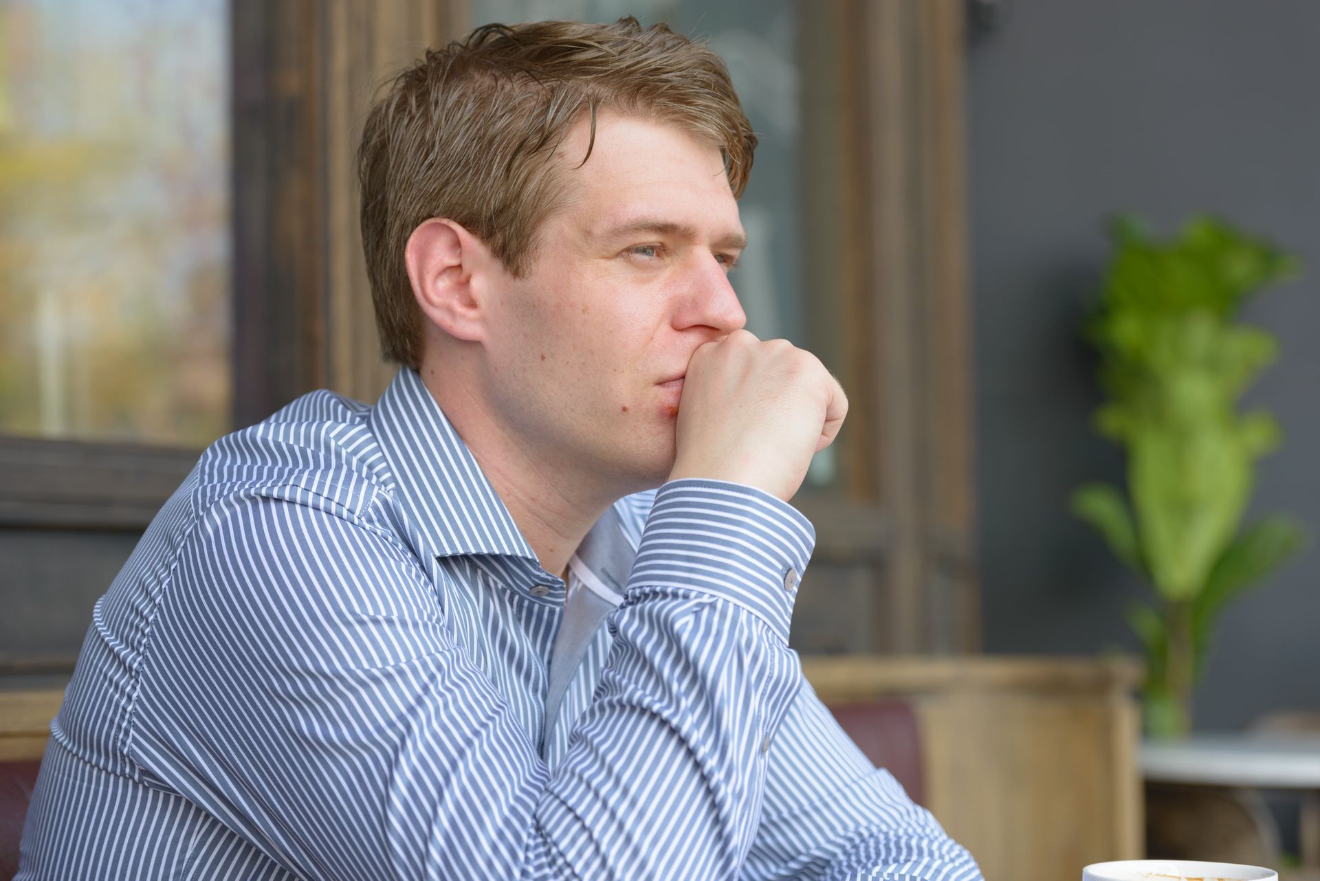 Man thinking contemplatively after individual marriage counseling