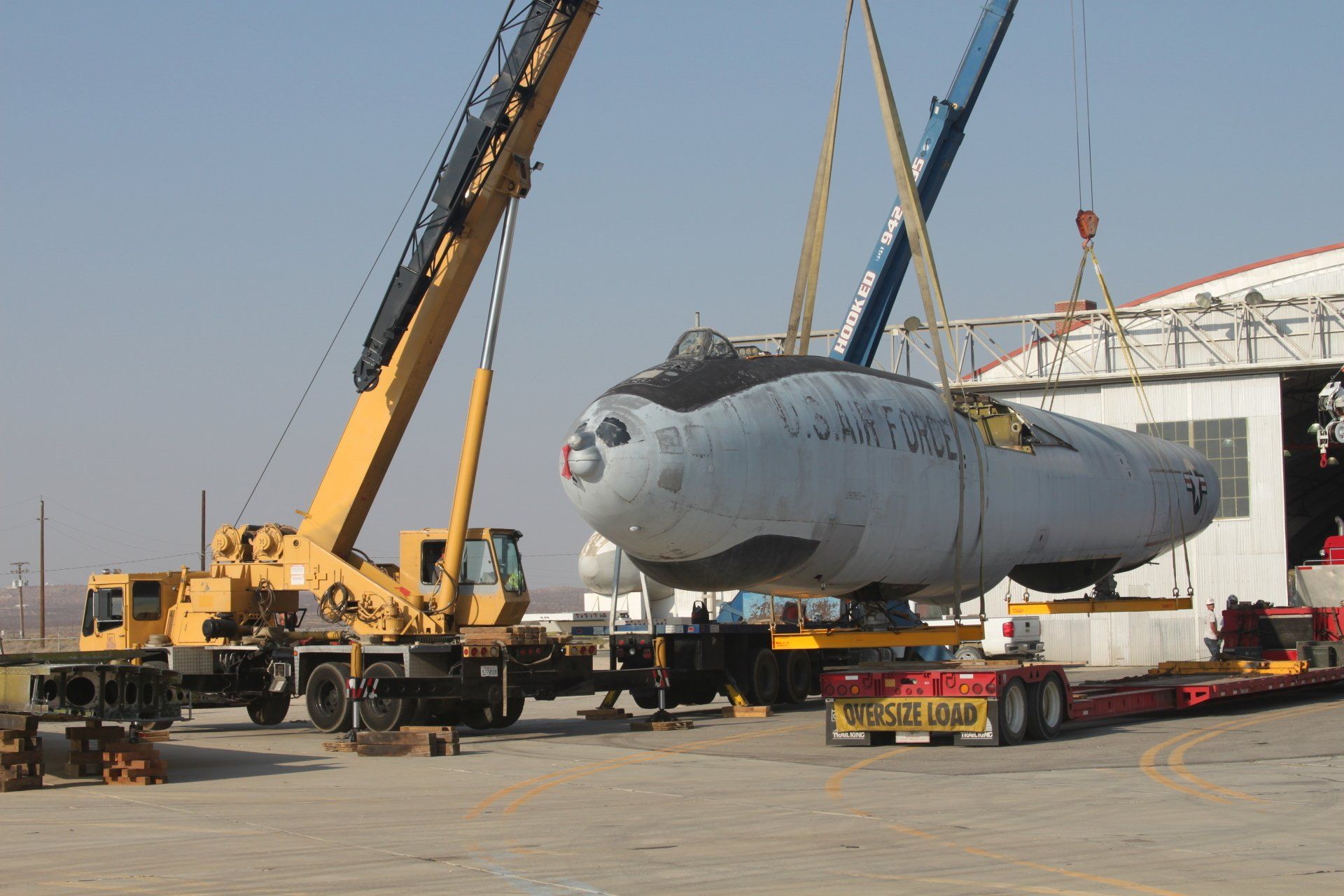 Crane Lifting a Car — Lancaster, CA — Get Hooked Crane Service