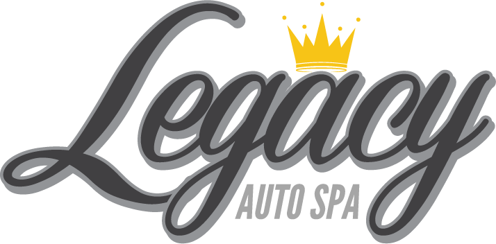 Legacy Auto Spa logo with gray script text and a gold crown above the “g”