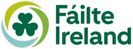 Fáilte Ireland logo with green shamrock icon and teal text on a white background