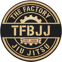 Logo for The Factory Jiu Jitsu: circular, black and tan with text and a gear symbol. "TFBJJ" is prominently displayed.