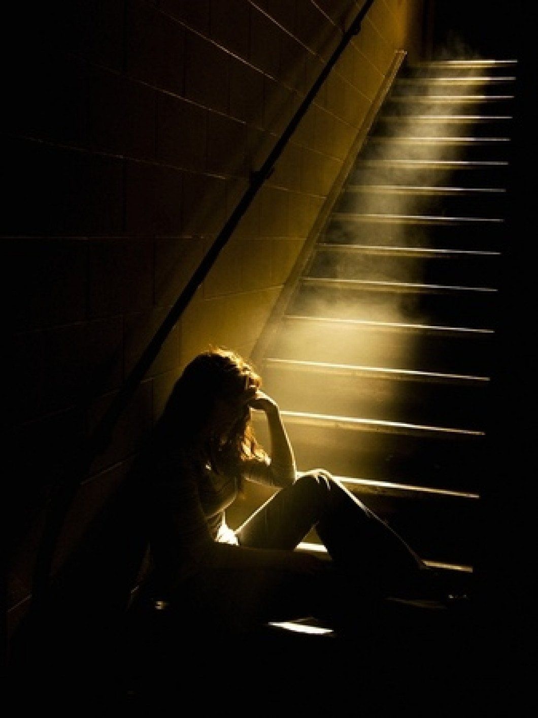 Woman on Dark Stairs