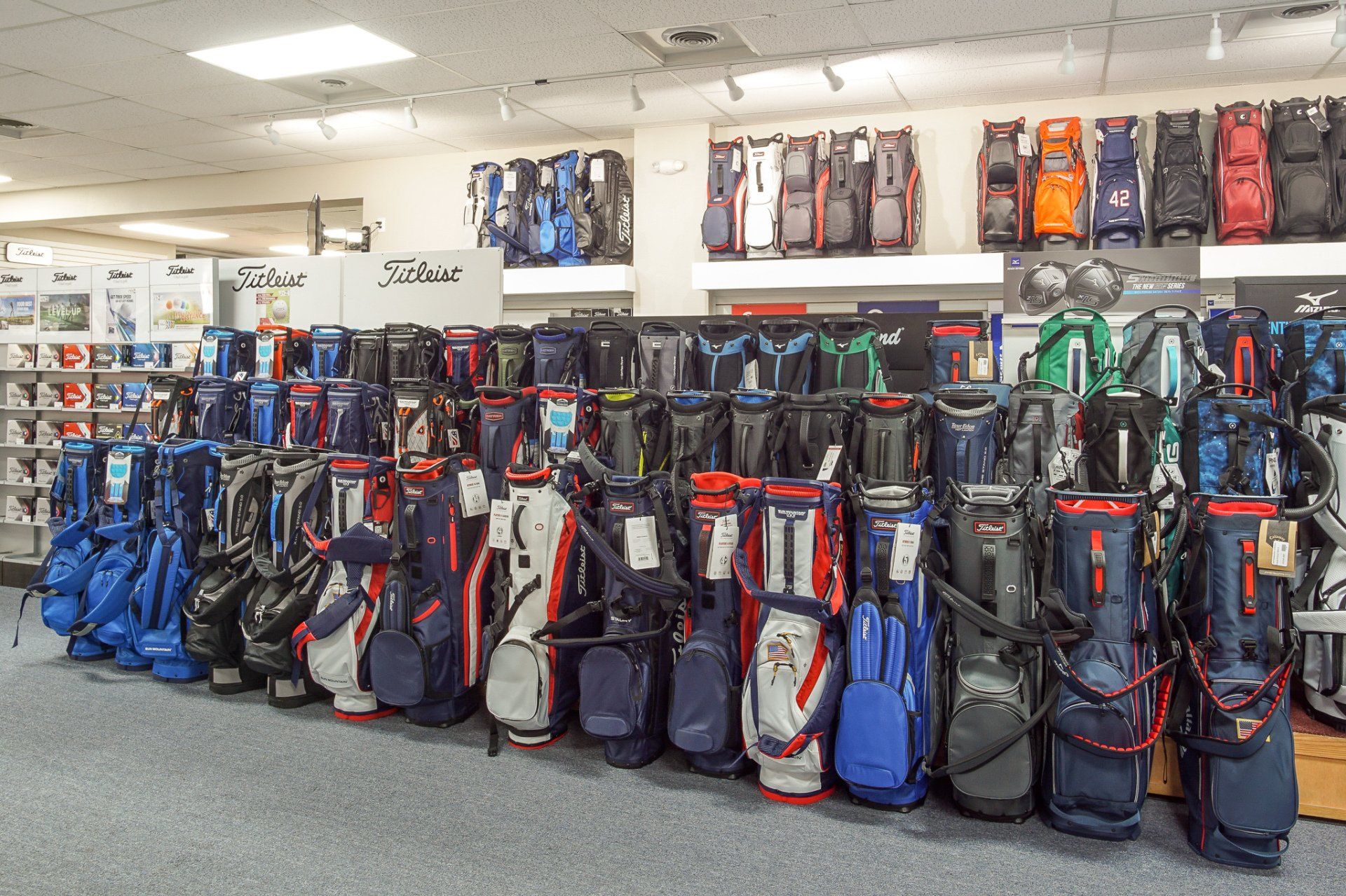 man with golf clubs