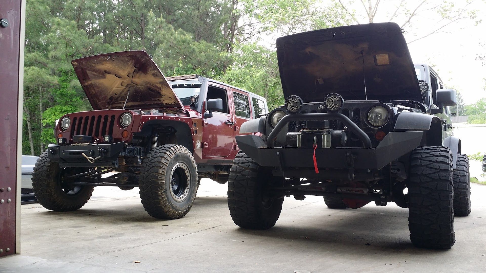Lifted Jeep Wranglers Parked Outside Auto Repair Shop in Kennesaw, GA | Revolution Auto Service