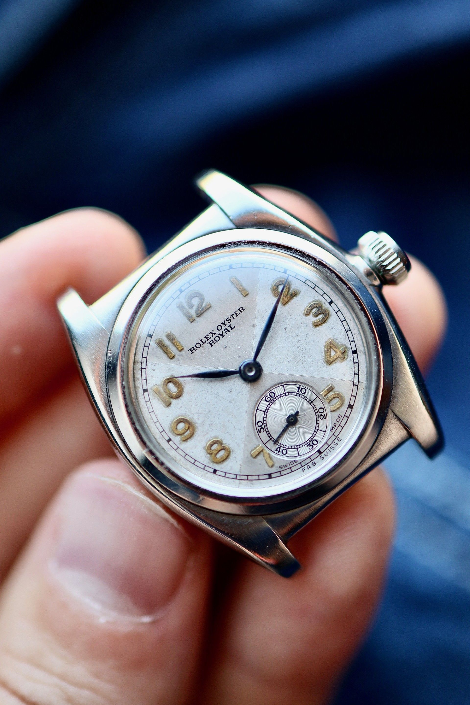 An exceedingly rare Rolex “flat back” in a Rolesium case w/ non luminous bow tie dial | circa 30’s