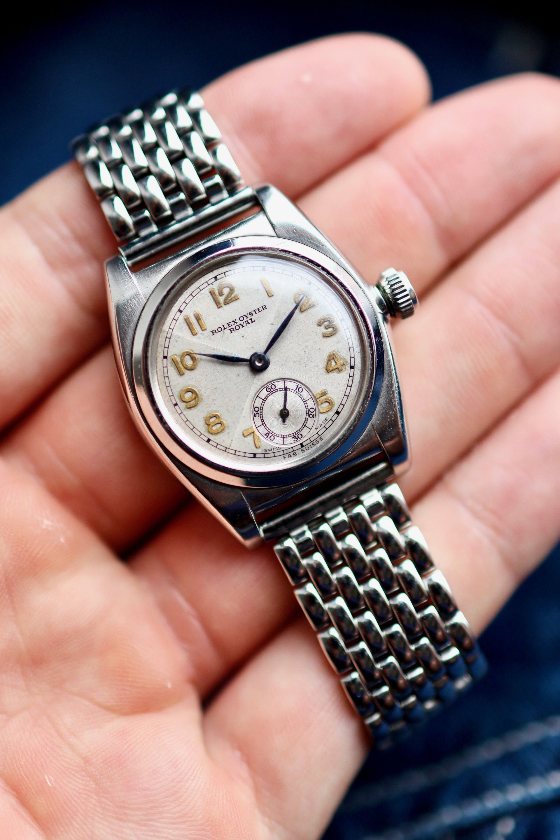 An exceedingly rare Rolex “flat back” in a Rolesium case w/ non luminous bow tie dial | circa 30’s