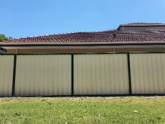Colorbond fence in cream colour with black lining for aesthetic and security installed in a party hall in Ballarat VIC.