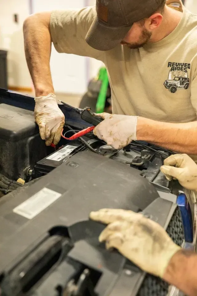 Mechanic Fixing Electrical Wirings | Revived Rides