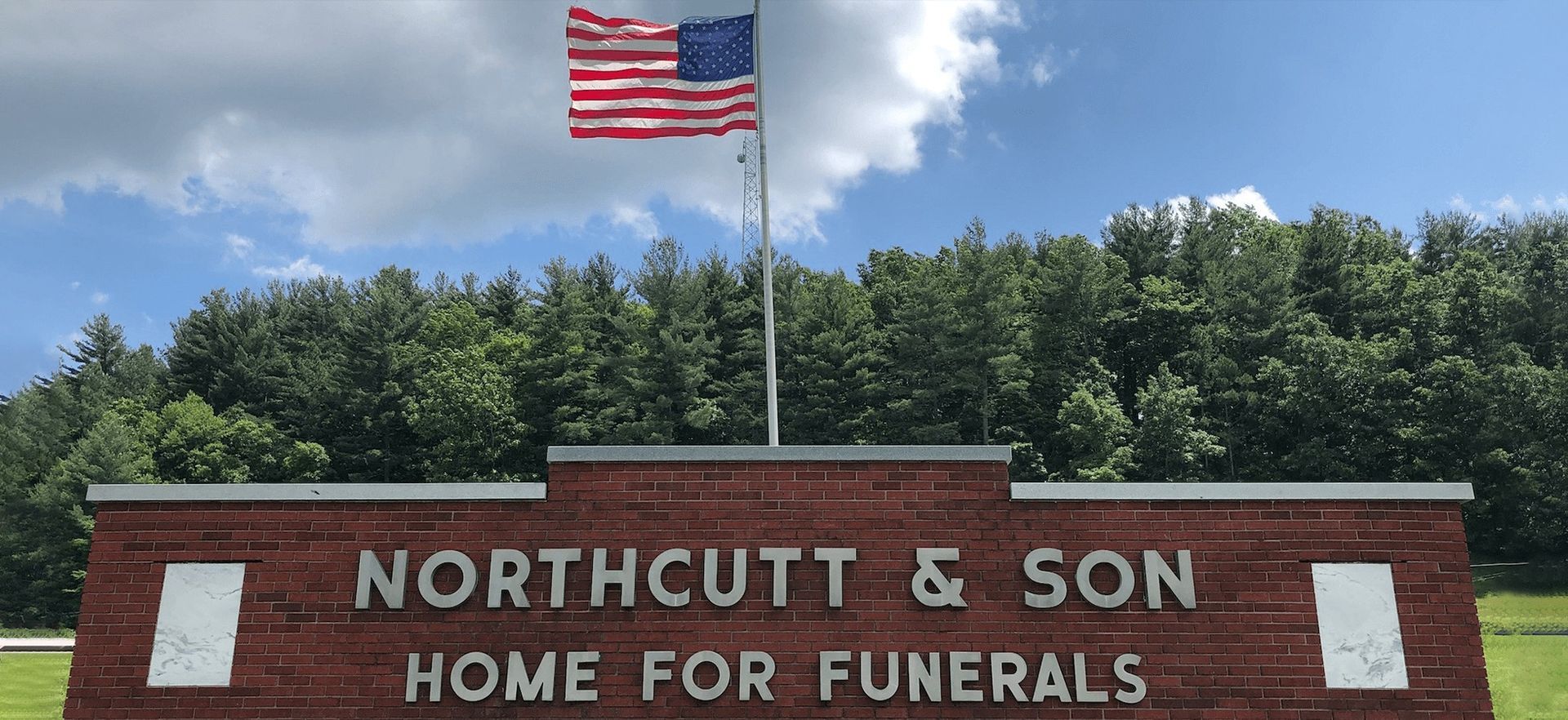 A brick sign for northcutt & son home for funerals